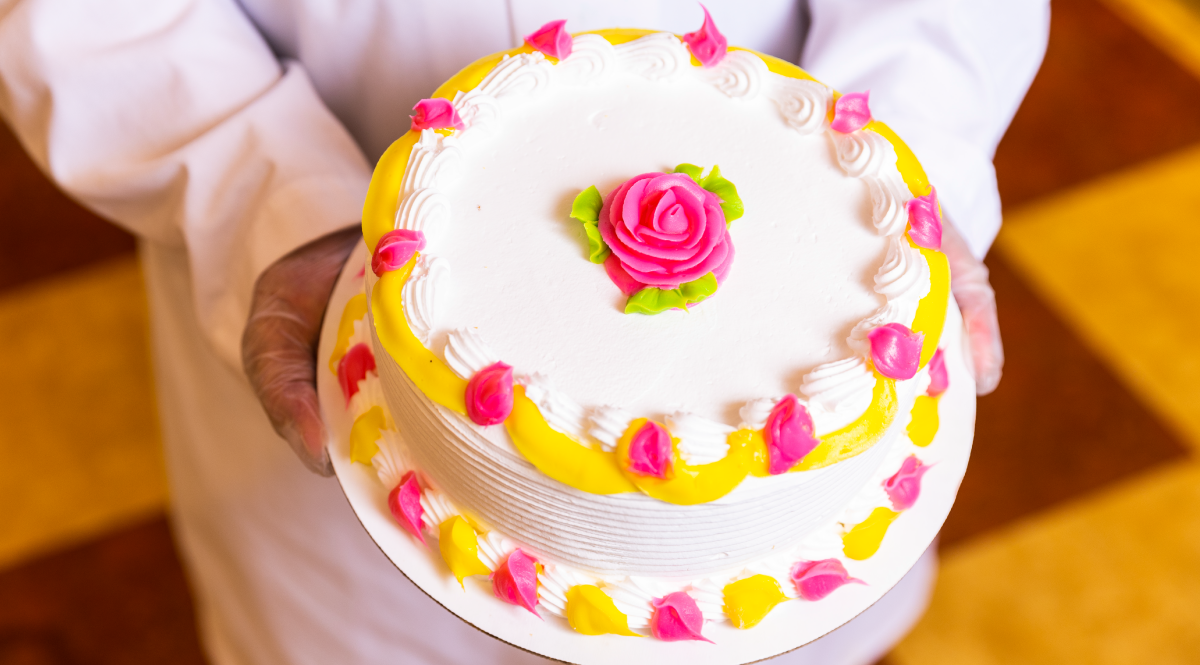 Pink and yellow floral cake.
