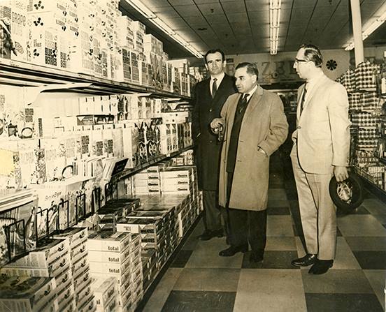 T.A. Demoulas and George Demoulas inside store